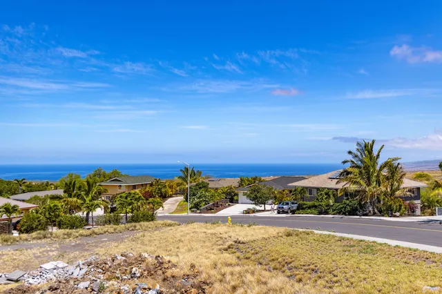 a view of a beach with a ocean view