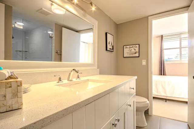 a view of a hallway with washer and dryer