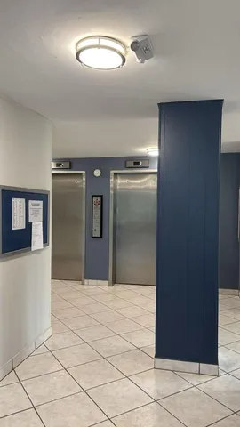 a view of swimming pool with chairs