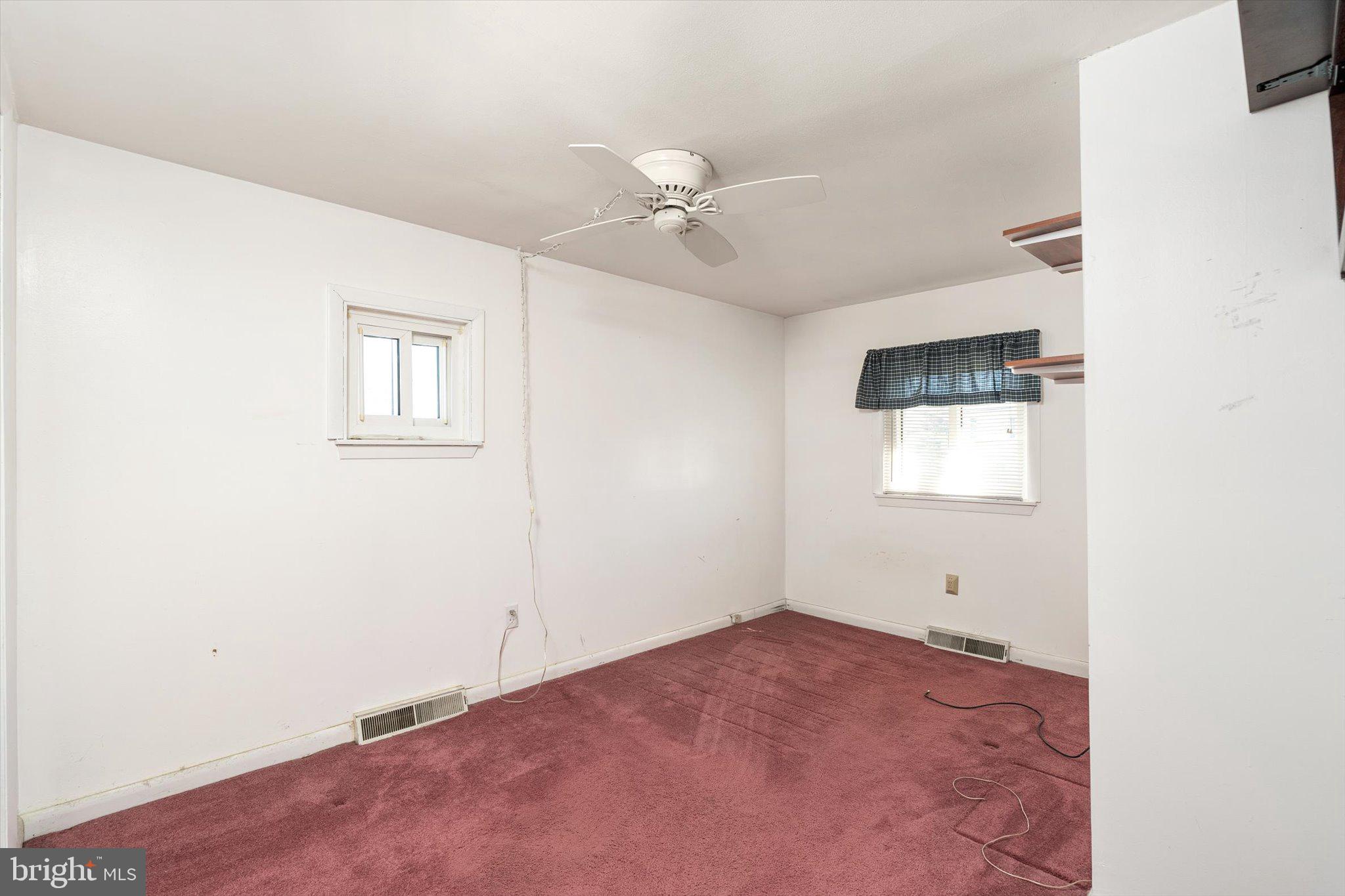 16 Fenway Road Hamilton, NJ 08620 - Photo 15 of 32 an empty room with windows and fan