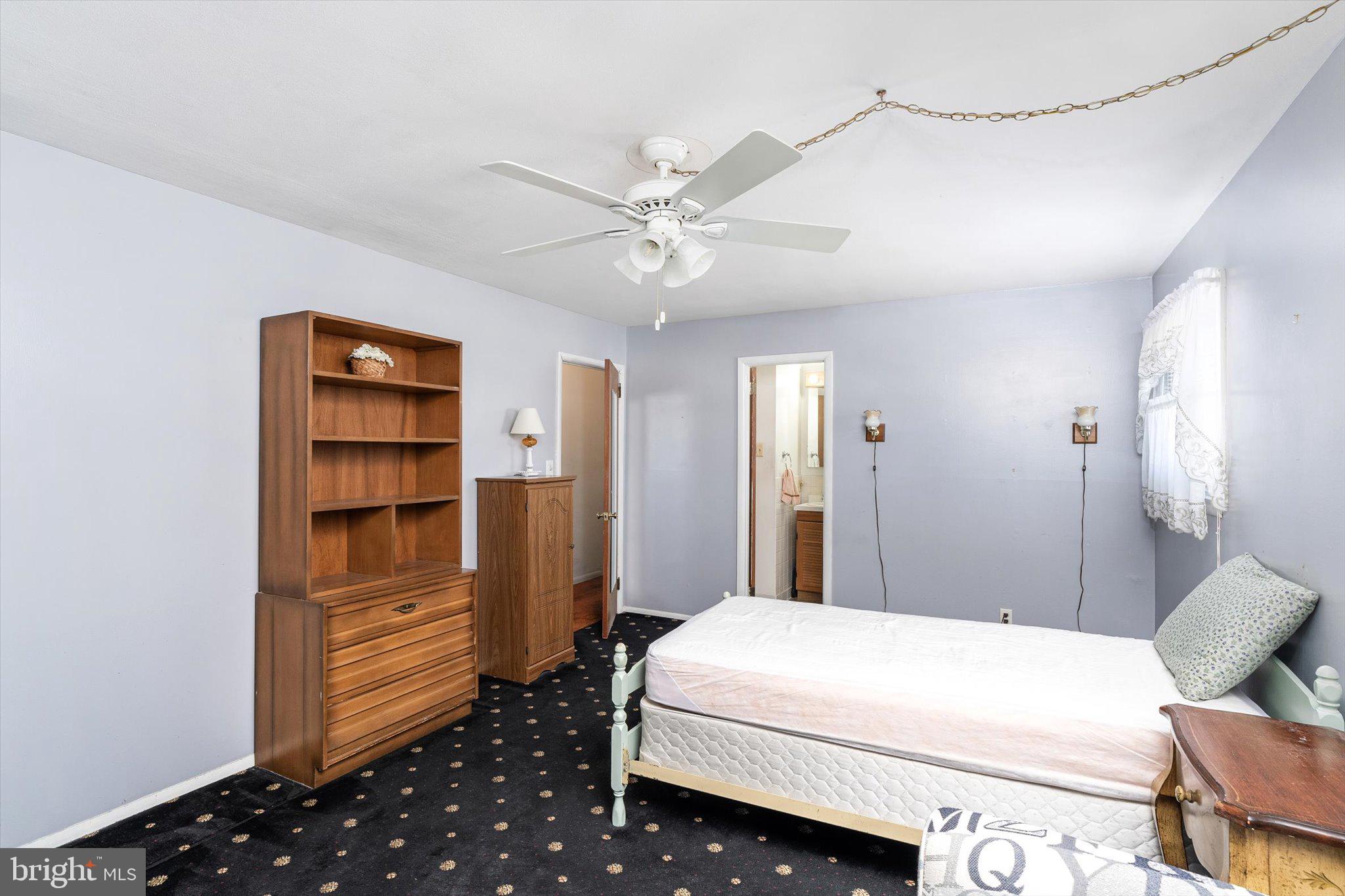 16 Fenway Road Hamilton, NJ 08620 - Photo 19 of 32 a bedroom with a bed and cabinets