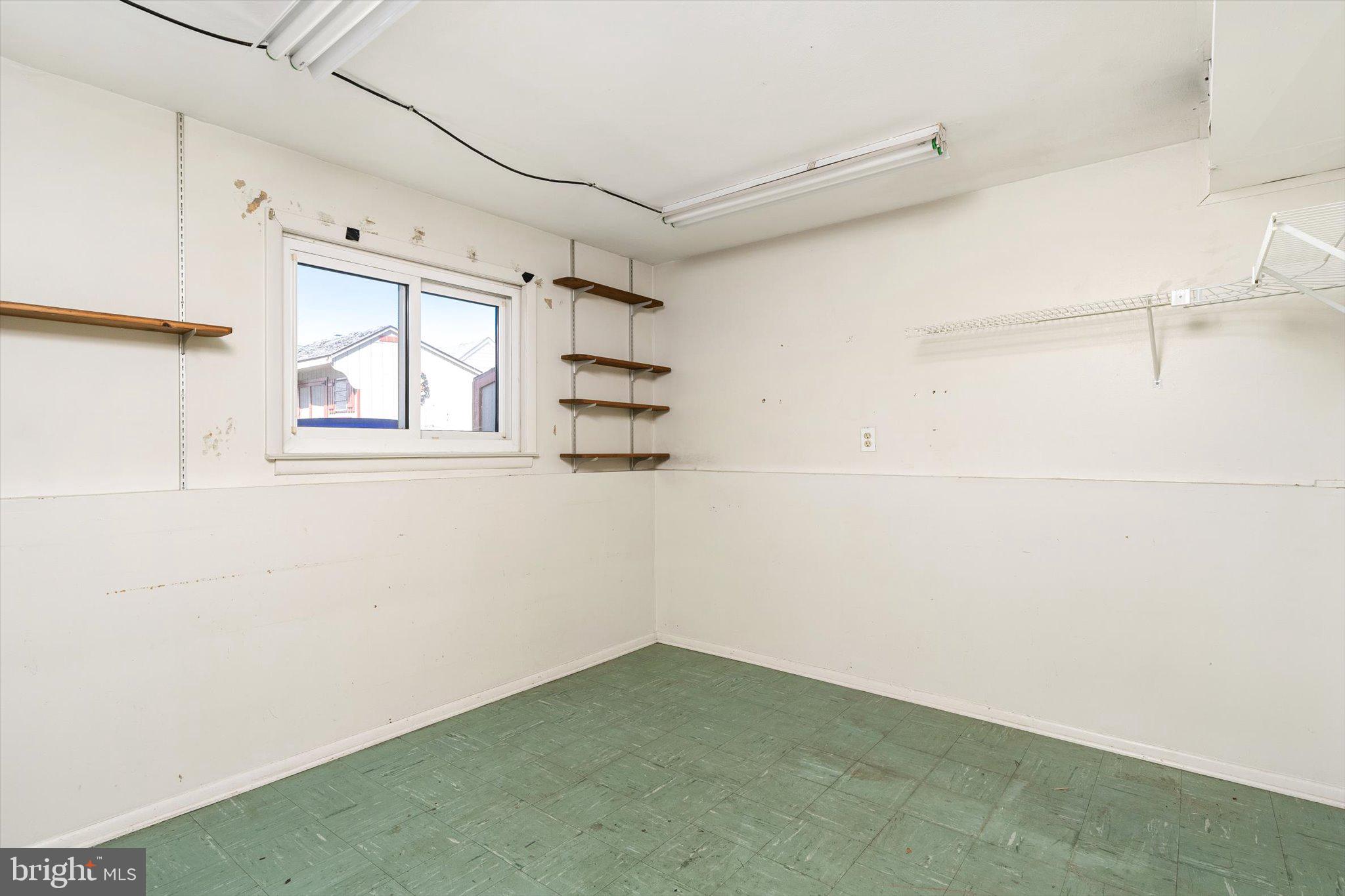 16 Fenway Road Hamilton, NJ 08620 - Photo 24 of 32 a view of empty room with windows