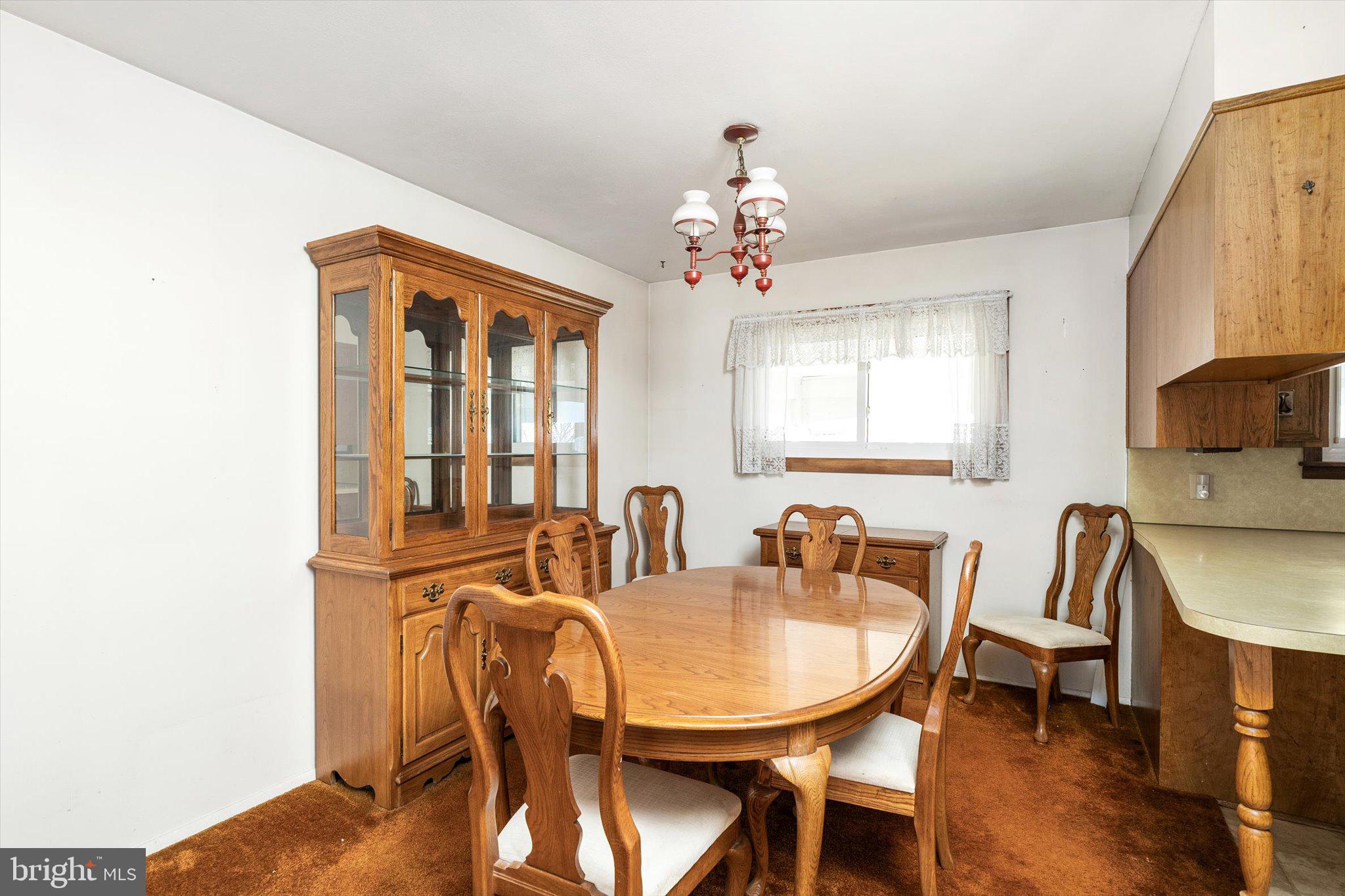 16 Fenway Road Hamilton, NJ 08620 - Photo 8 of 32 a view of a a dining room with furniture window and wooden floor