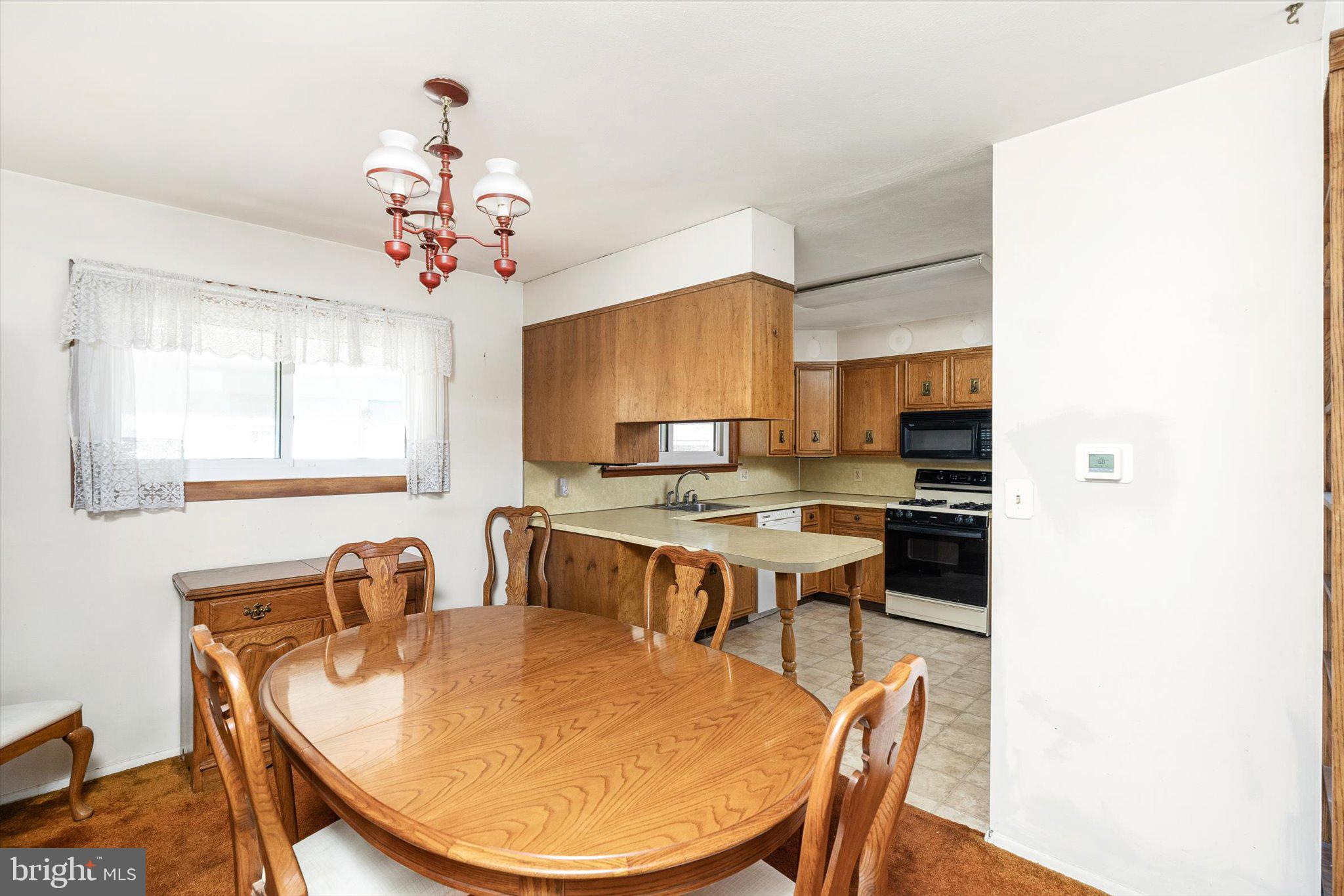 16 Fenway Road Hamilton, NJ 08620 - Photo 9 of 32 a kitchen with a table and chairs in it