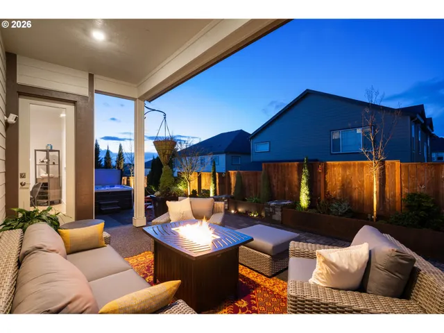 a backyard of a house with seating space
