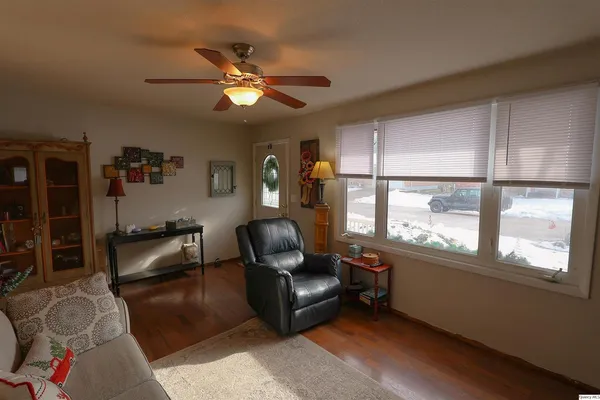 a living room with furniture and a window