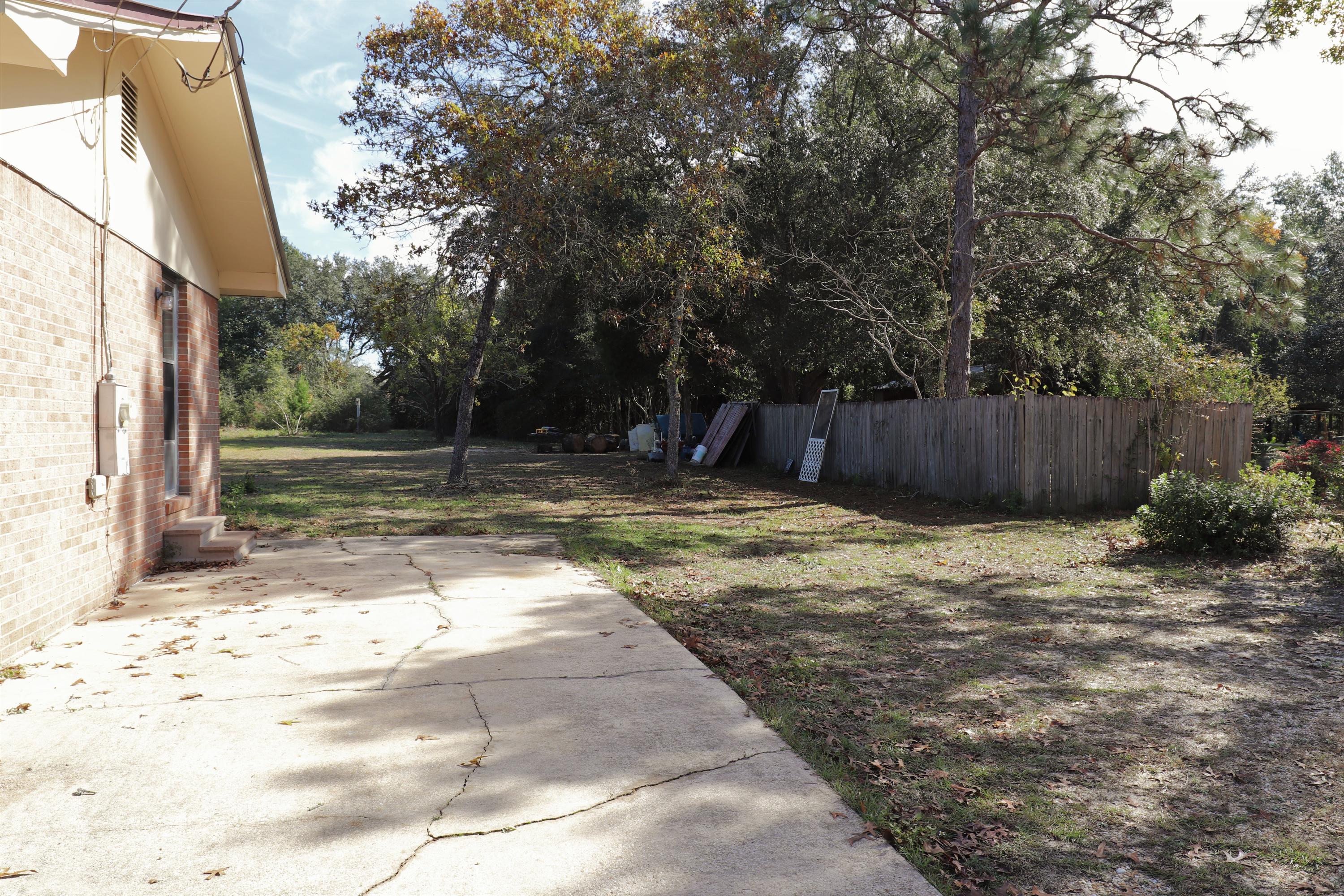 5347 Monterrey Road Crestview, FL 32539 - Photo 6 of 32 Right side of home from street