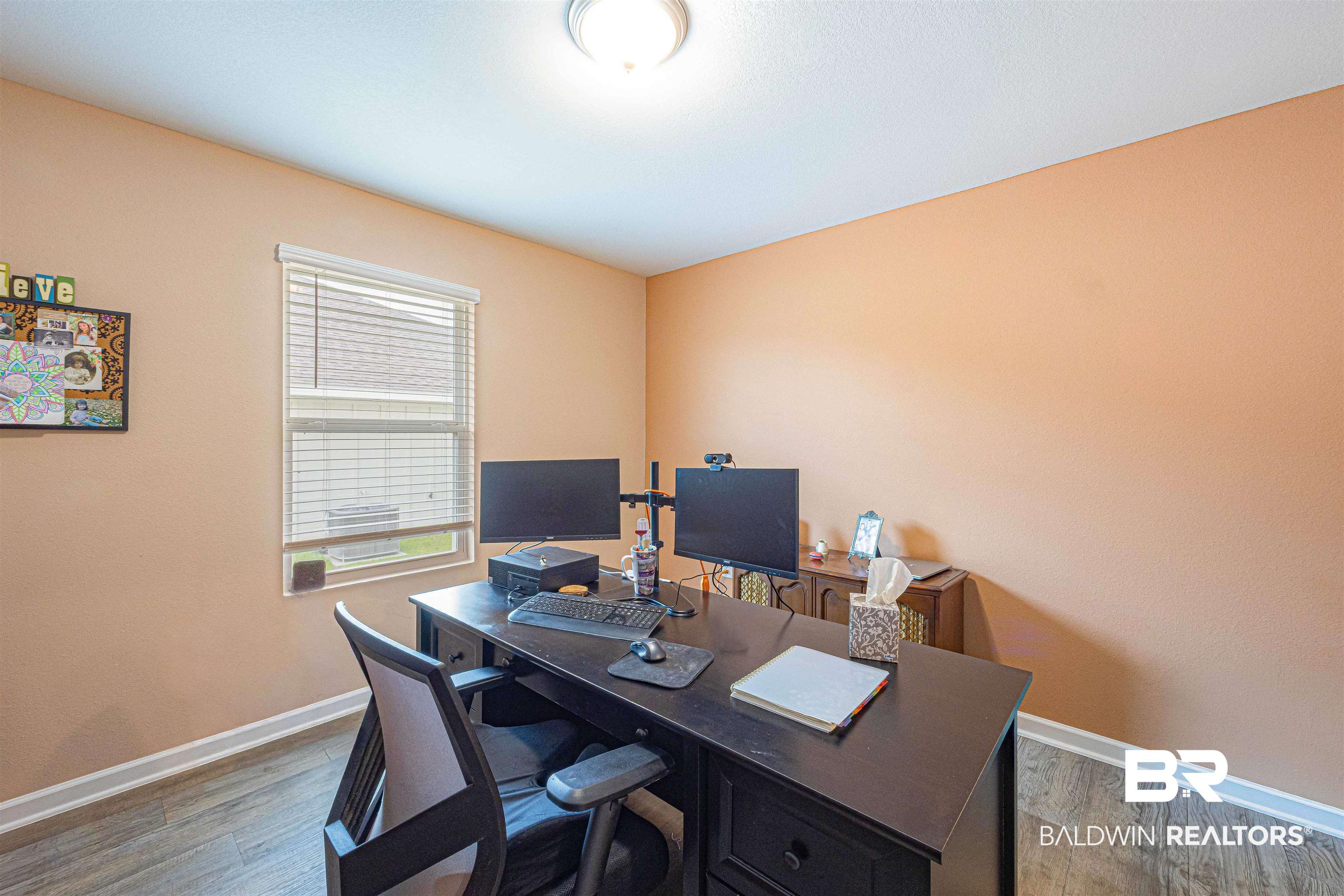 14843 Forsythia Loop Silverhill, AL 36576 - Photo 36 of 51 Home office with light wood-style flooring and baseboards