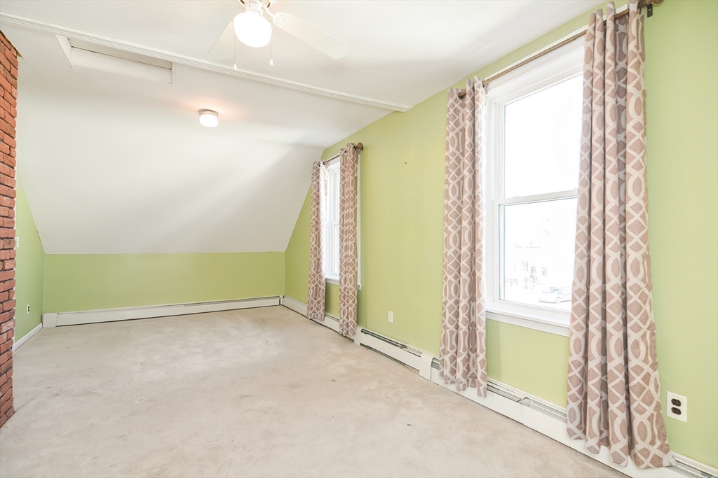 58 Holmes Road Dedham, MA 02026 - Photo 18 of 29 a view of empty room with window