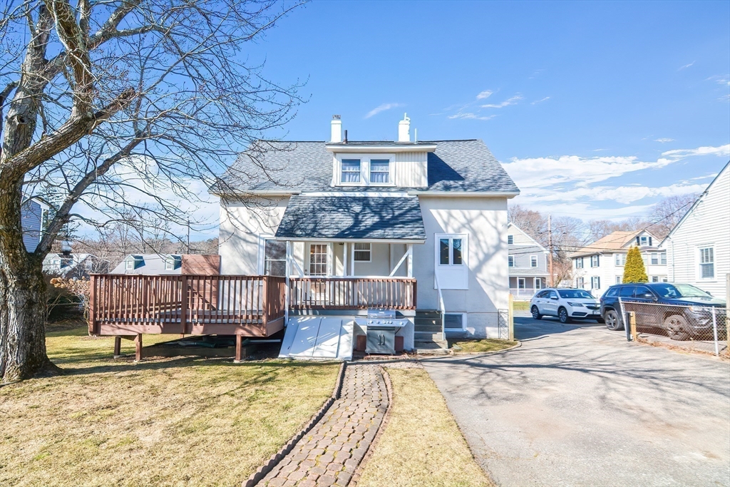 58 Holmes Road Dedham, MA 02026 - Photo 27 of 29 a view of a house with a swimming pool