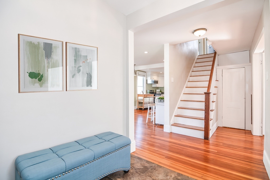 58 Holmes Road Dedham, MA 02026 - Photo 4 of 29 a living room with furniture and a wooden floor