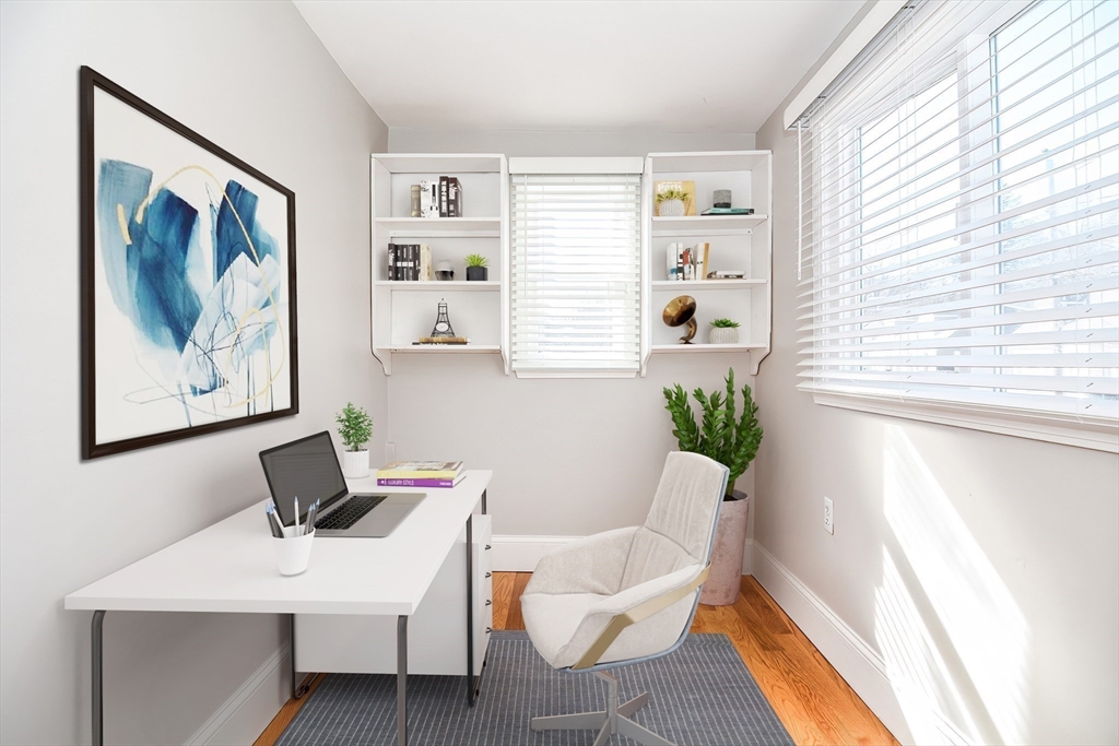 58 Holmes Road Dedham, MA 02026 - Photo 5 of 29 a view of a workspace with furniture and a window