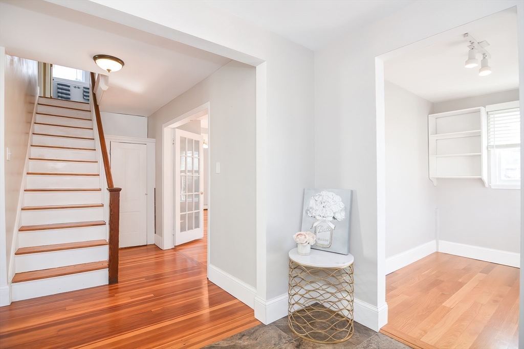 58 Holmes Road Dedham, MA 02026 - Photo 6 of 29 a view of entryway with wooden floor
