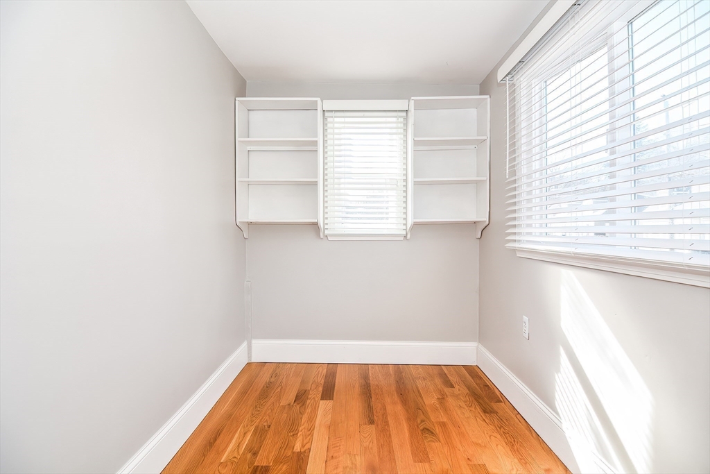 58 Holmes Road Dedham, MA 02026 - Photo 7 of 29 a view of a room that has a window in it