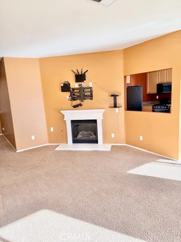 a view of a livingroom with a fireplace