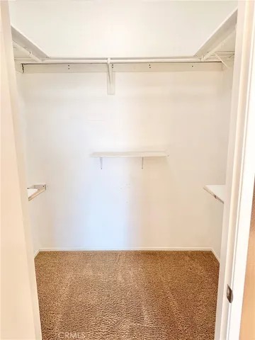 a bathroom with a bathtub sink and a mirror