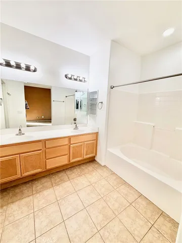 a bathroom with a bath tub