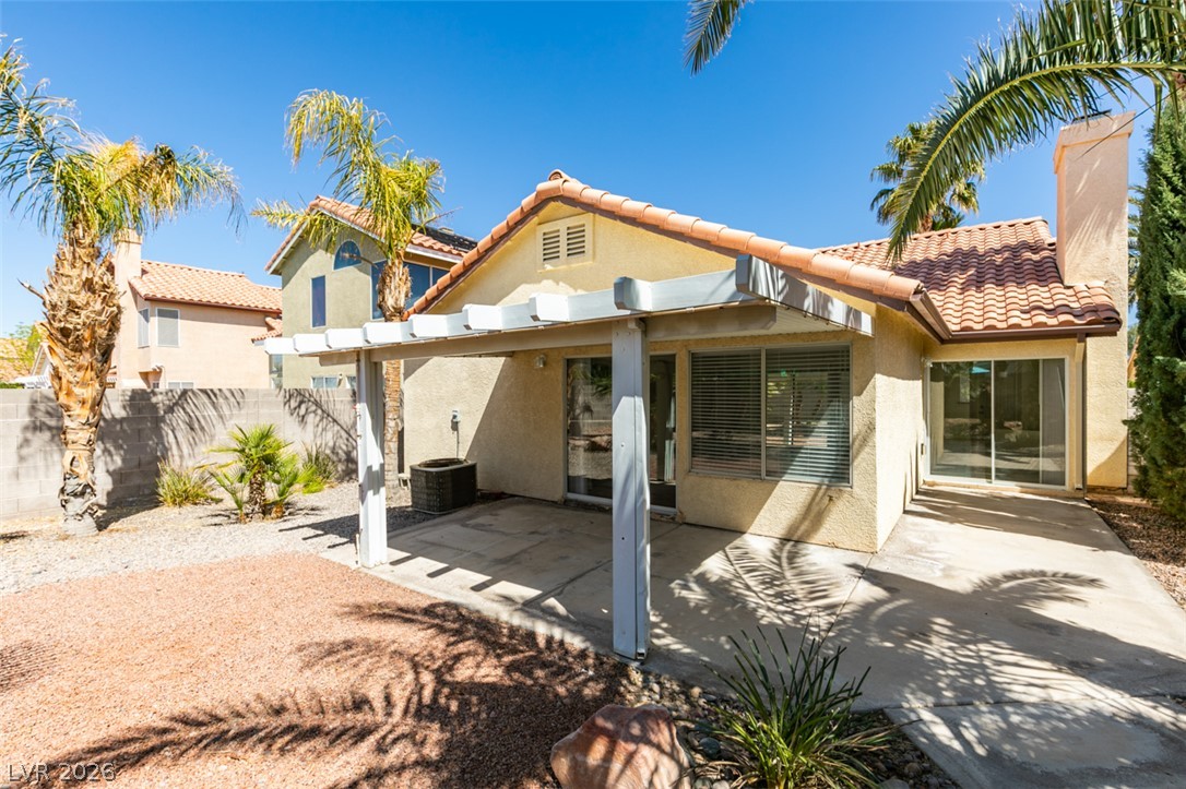 307 Cavalla Street Henderson, NV 89074 - Photo 41 of 44 A spacious private yard features a covered patio perfect for al fresco dining.