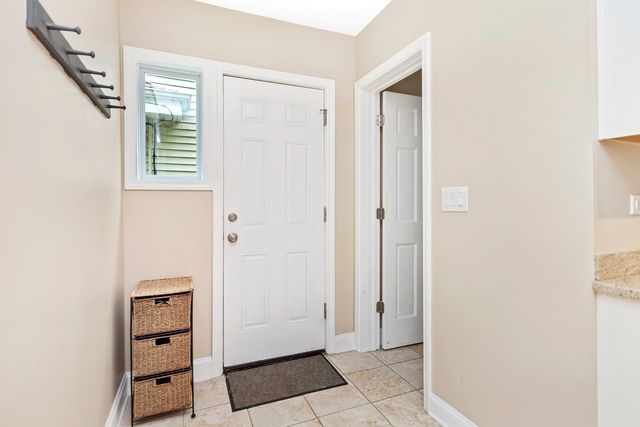 a view of an entryway with staircase