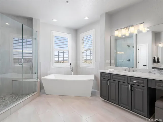 a view of a lake with houses in the back