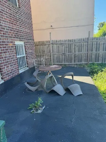 a view of a terrace with chairs