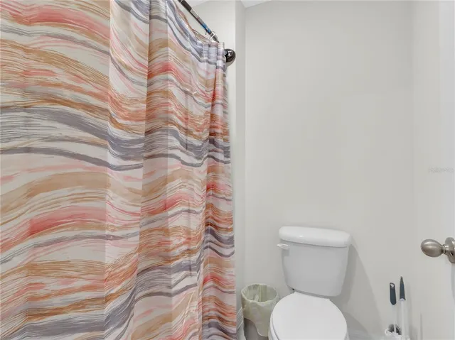 a front view of house with yard and outdoor seating