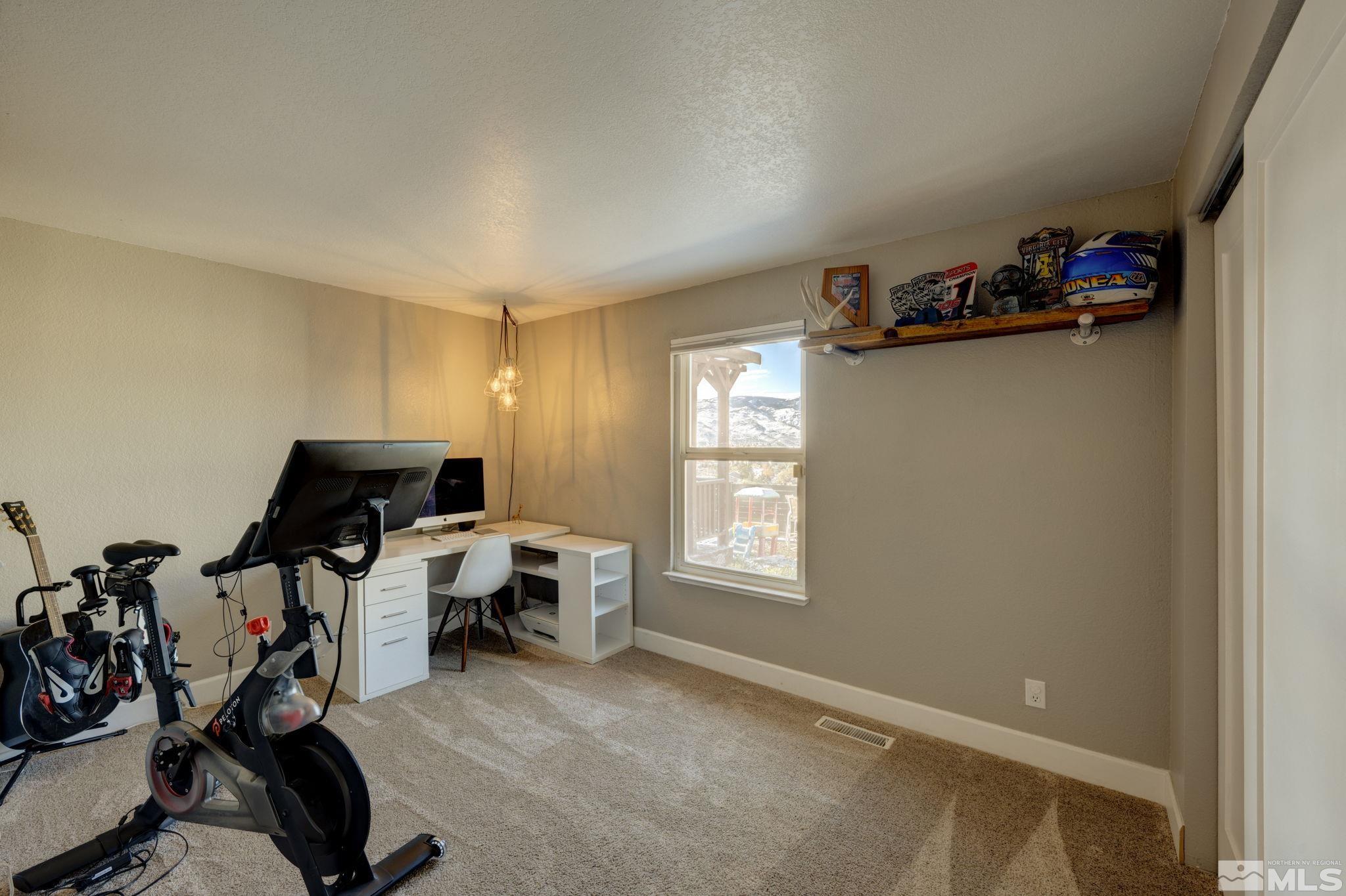 3932 Buckingham Square Reno, NV 89503 - Photo 24 of 40 a view of a workspace with a window