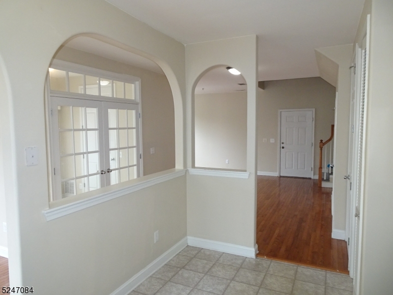 112 Limerick Lane, Unit 1 Phillipsburg, NJ 08865 - Photo 13 of 41 an empty room with windows and entrance