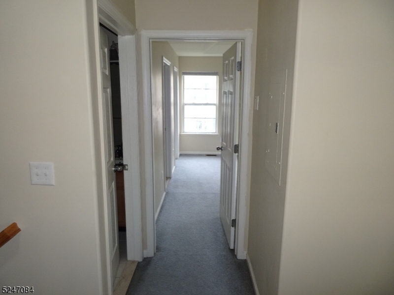 112 Limerick Lane, Unit 1 Phillipsburg, NJ 08865 - Photo 20 of 41 a view of a livingroom from a hallway