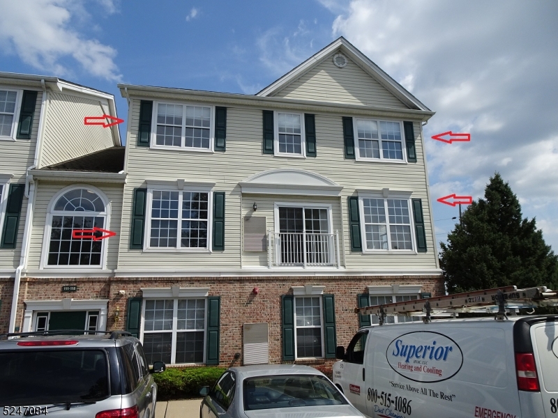 112 Limerick Lane, Unit 1 Phillipsburg, NJ 08865 - Photo 2 of 41 a front view of residential houses and car parked