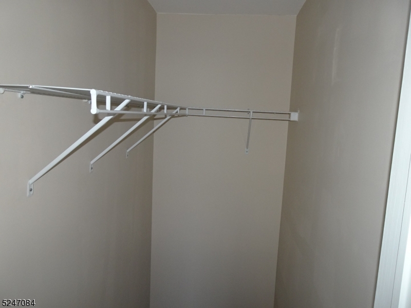 112 Limerick Lane, Unit 1 Phillipsburg, NJ 08865 - Photo 26 of 41 a view of a room with racks on the wall