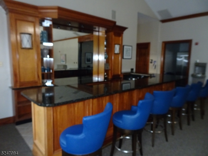 112 Limerick Lane, Unit 1 Phillipsburg, NJ 08865 - Photo 35 of 41 a view of a lobby area with furniture and chandelier