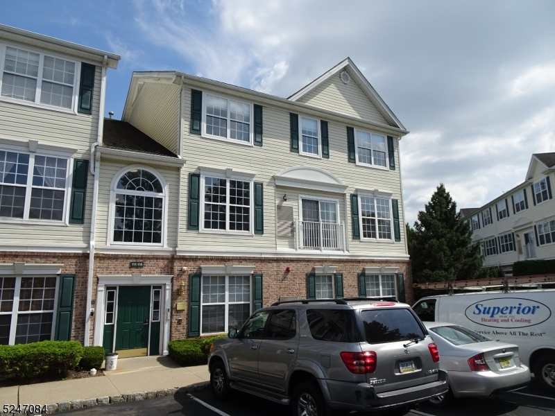 112 Limerick Lane, Unit 1 Phillipsburg, NJ 08865 - Photo 41 of 41 a front view of a residential apartment building with a yard