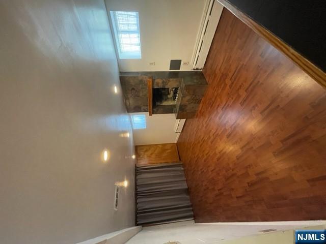 209 8th Street Fairview, NJ 07022 - Photo 13 of 41 a view of kitchen with a sink and a fireplace