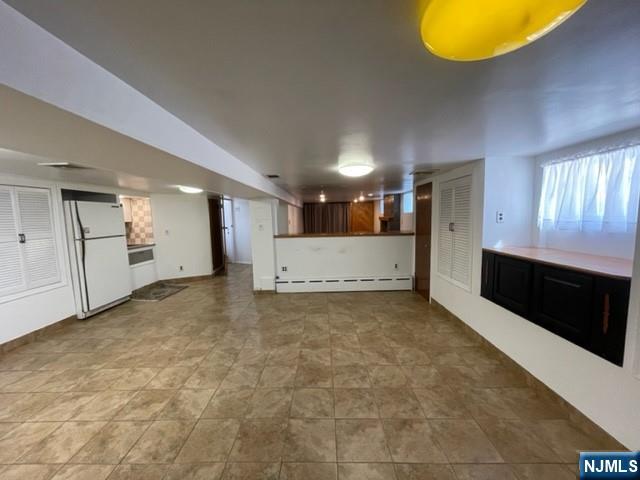 209 8th Street Fairview, NJ 07022 - Photo 15 of 41 a view of an empty room