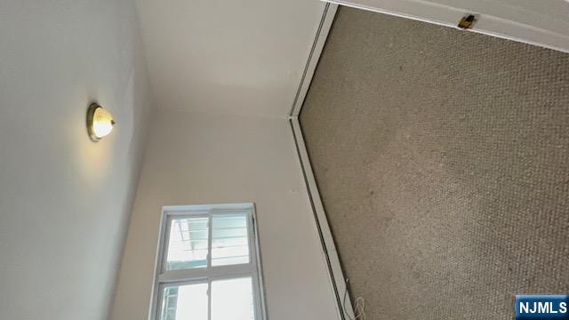 209 8th Street Fairview, NJ 07022 - Photo 24 of 41 an empty room with a window