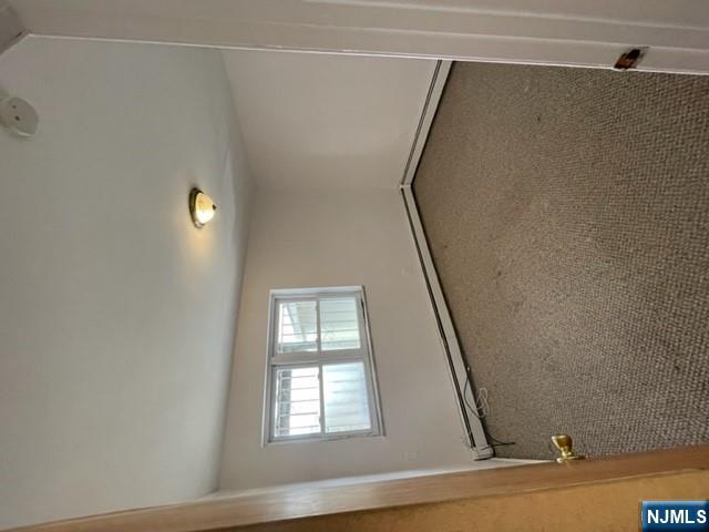 209 8th Street Fairview, NJ 07022 - Photo 25 of 41 an empty room with a window