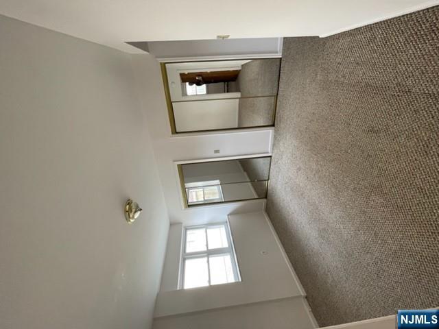 209 8th Street Fairview, NJ 07022 - Photo 26 of 41 a view of empty room with windows