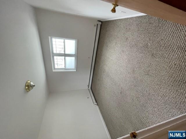 209 8th Street Fairview, NJ 07022 - Photo 28 of 41 a view of an empty room with a window