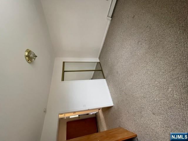 209 8th Street Fairview, NJ 07022 - Photo 29 of 41 an empty room with windows