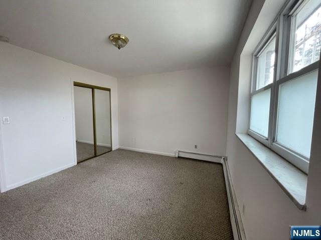 209 8th Street Fairview, NJ 07022 - Photo 31 of 41 a view of an empty room with a window