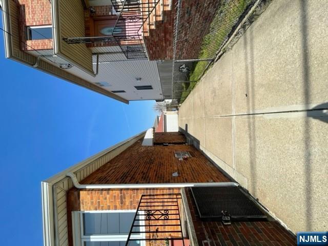 209 8th Street Fairview, NJ 07022 - Photo 4 of 41 a house view with a outdoor space
