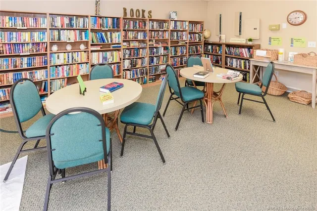 a dinning table and chairs in a room