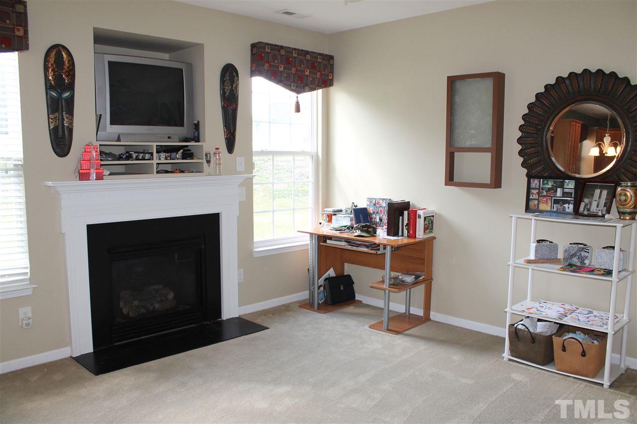 2812 Orchard Trace Way Raleigh, NC 27610 - Photo 8 of 24 This Living room has a beautiful gas fireplace and a cozy space to enjoy with others
