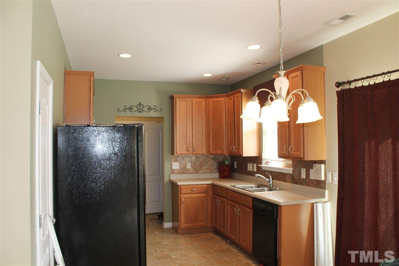 2812 Orchard Trace Way Raleigh, NC 27610 - Photo 10 of 24 Spacious Kitchen with upgraded tall cabinets