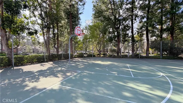 a swimming pool with outdoor seating and yard