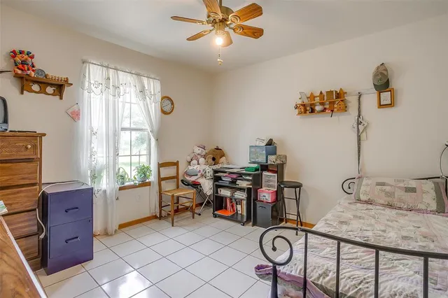 a workspace with furniture and window