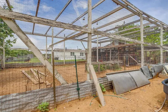 a view of swimming pool with a balcony