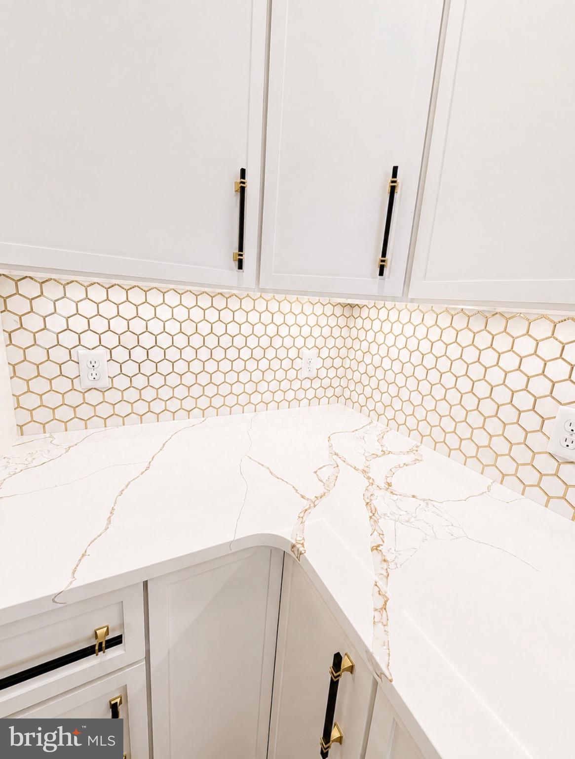 21963 Hardscrabble Road Georgetown, DE 19947 - Photo 8 of 43 Elegant kitchen with honeycomb tiles.