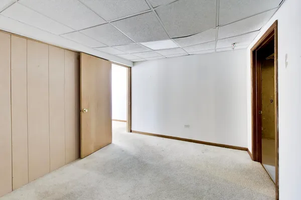 a picture of a bathroom with a shower